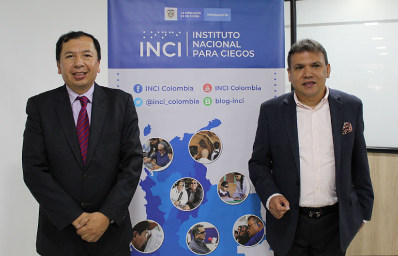 Director Carlos parra dussan junto al director de función pública