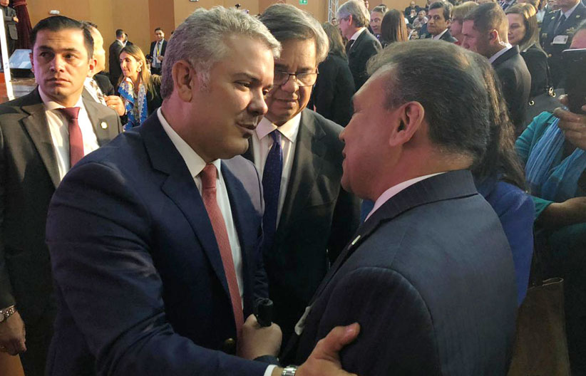 Carlos Parra Dussan junto al Presidente Ivan Duque