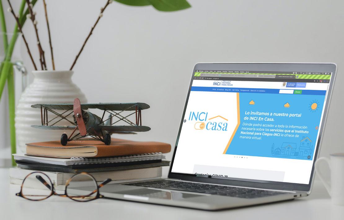 Fotografía, Computador con la imagen de INCI en CASA