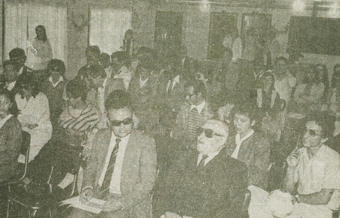 Fotografía, auditorio con personas con discapacidad visual